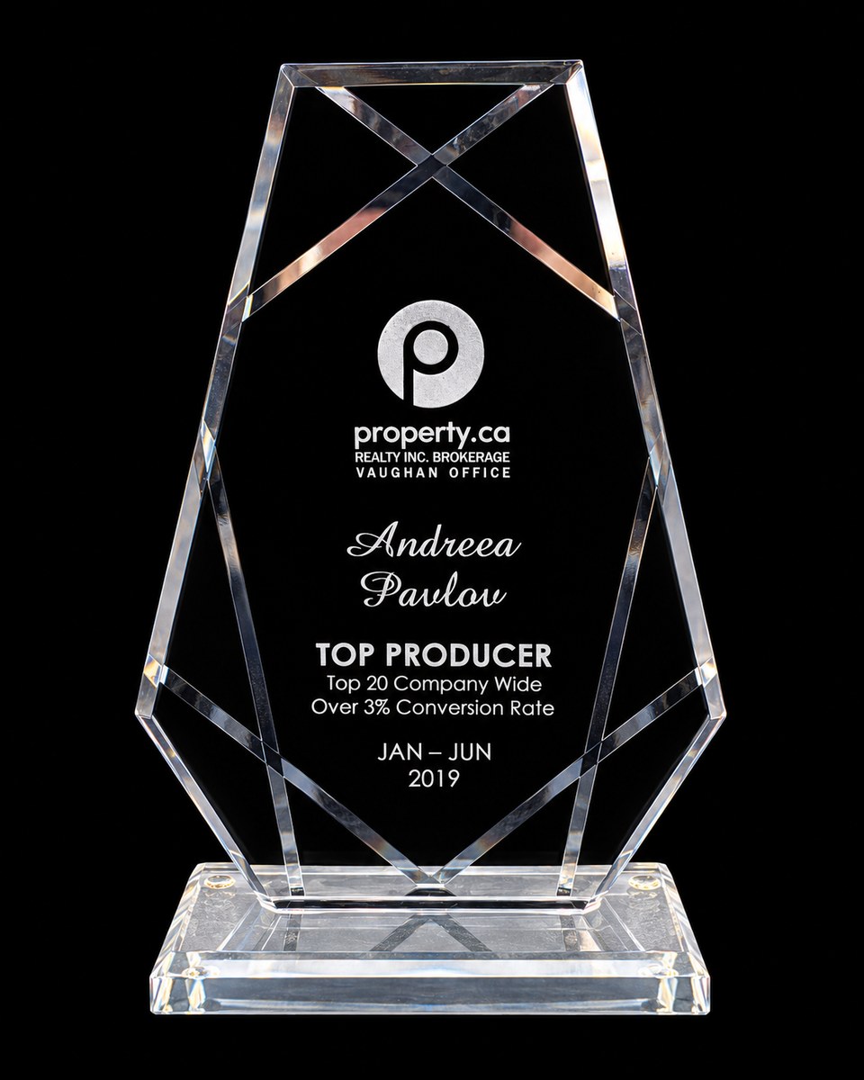 Glass award engraved “Top Producer, Top 20 Company Wide, Jan to Jun 2019, Andreea Pavlov, property.ca Vaughan Office”